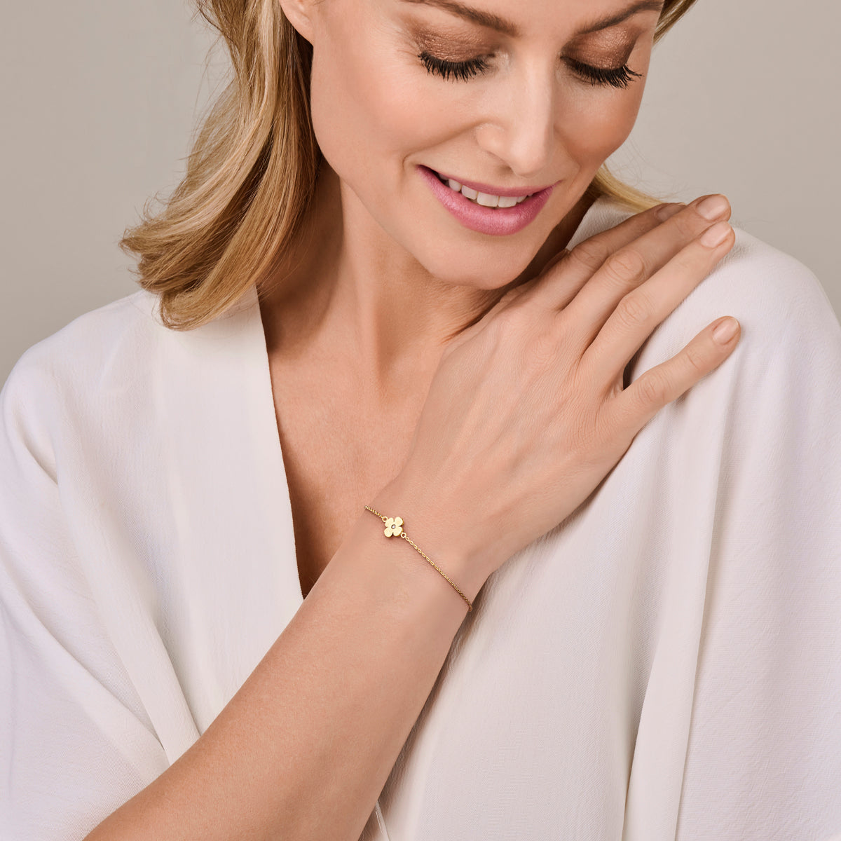 Armband bloem met zirkonia in goud – 16/18 cm